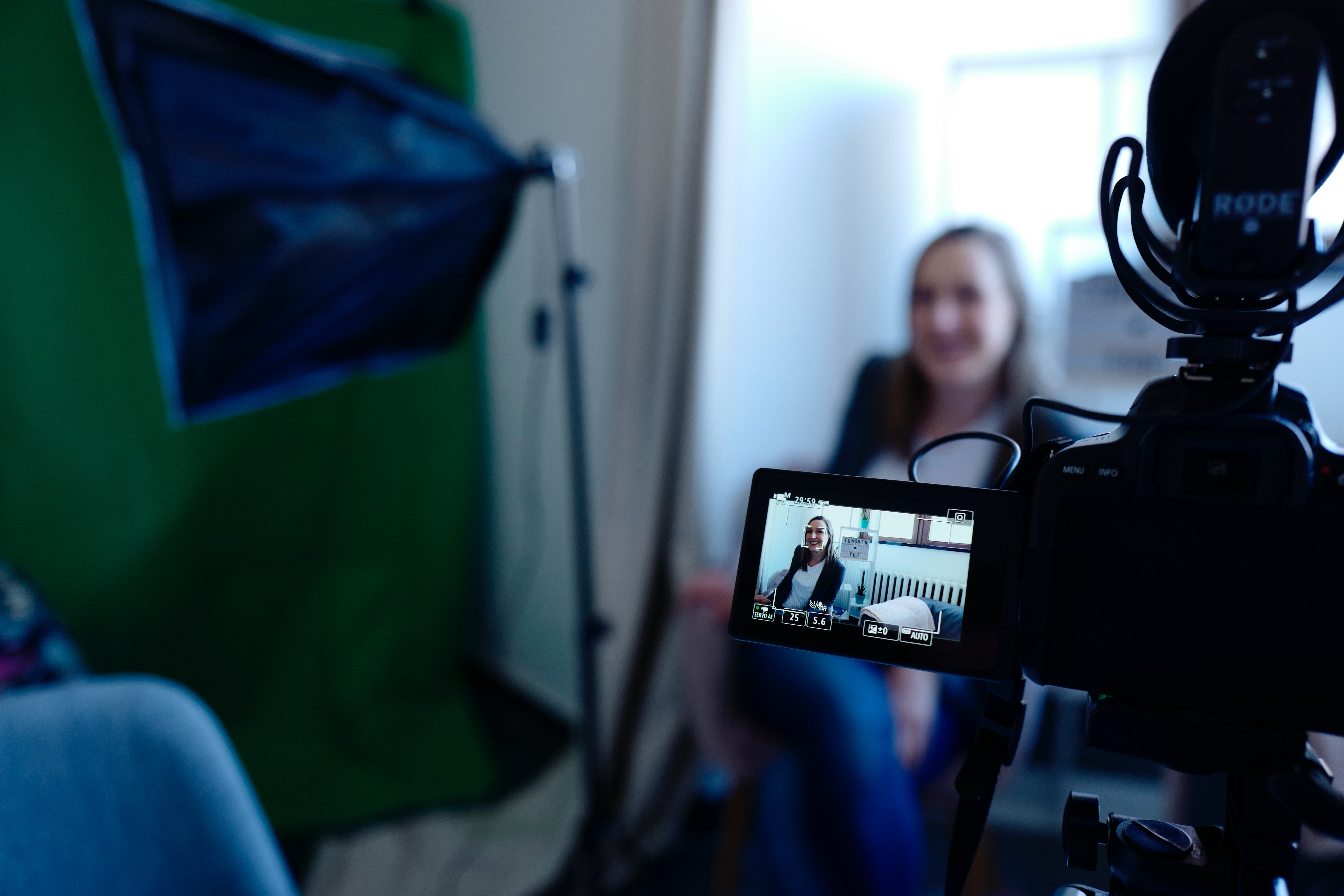 woman filming webinar