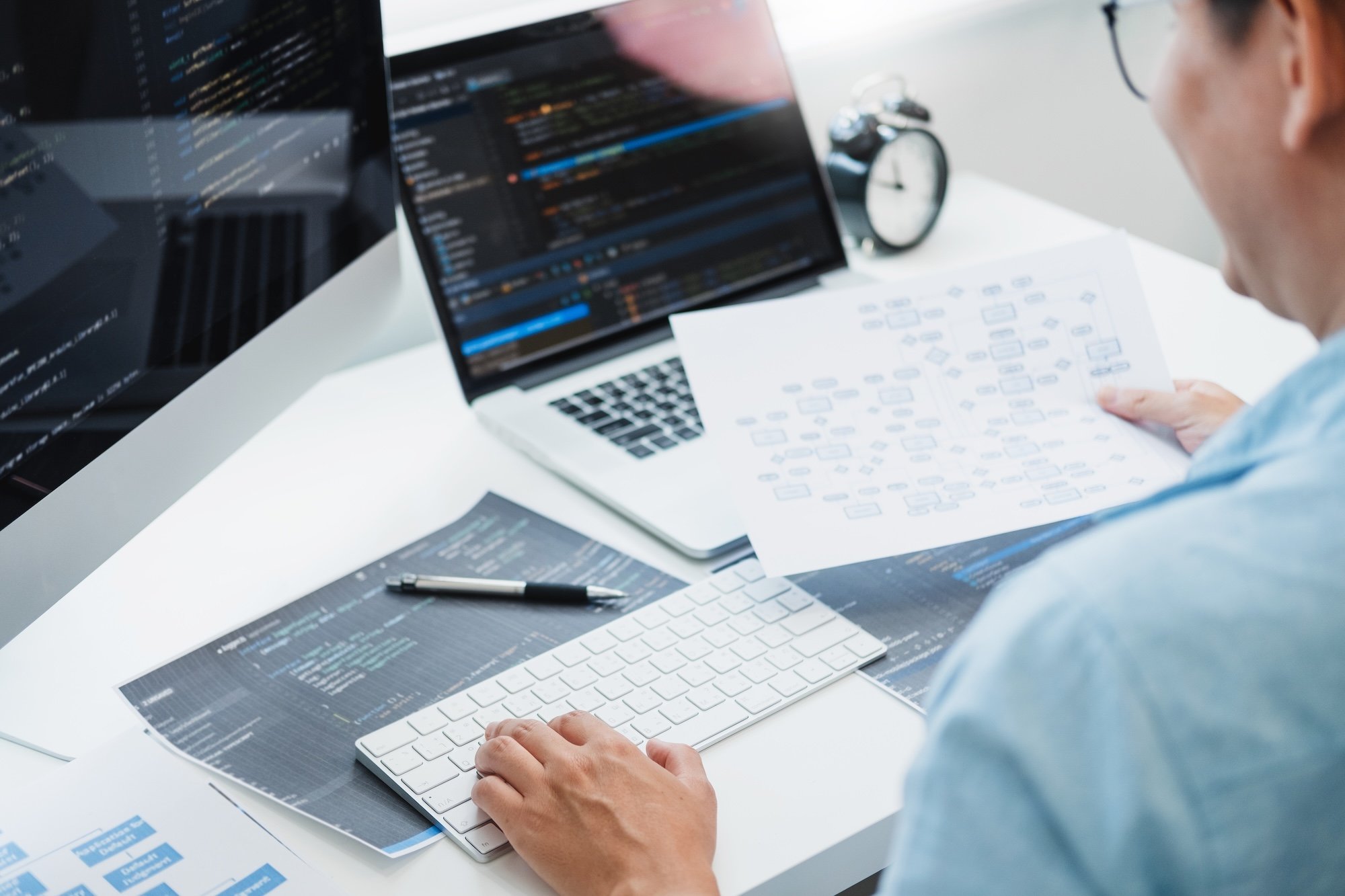 software-developer-working-at-desk-with-code-2026-01-06-10-55-17-utc