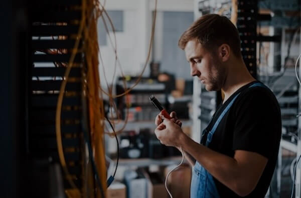 young-man-in-uniform-with-measuring-device-works-w-2023-11-27-05-26-02-utc